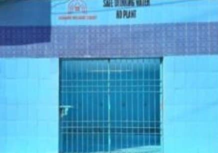 Water Plant 1 from the street, blue tiled building with a SAFE DRINKING WATER RO PLANT signboard